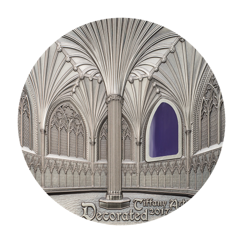 silver coin decorated with artistic Tiffany design on the reverse side